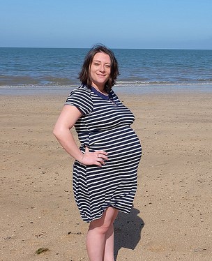 33 weeks pregnant, on the beach in Anglesey