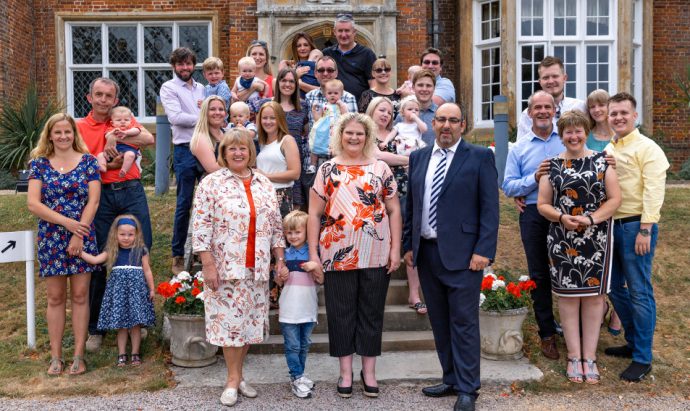 Bourn Hall family with (front, L-R) Grace MacDonald, Louise Brown, Dr Thanos Papathanasiou