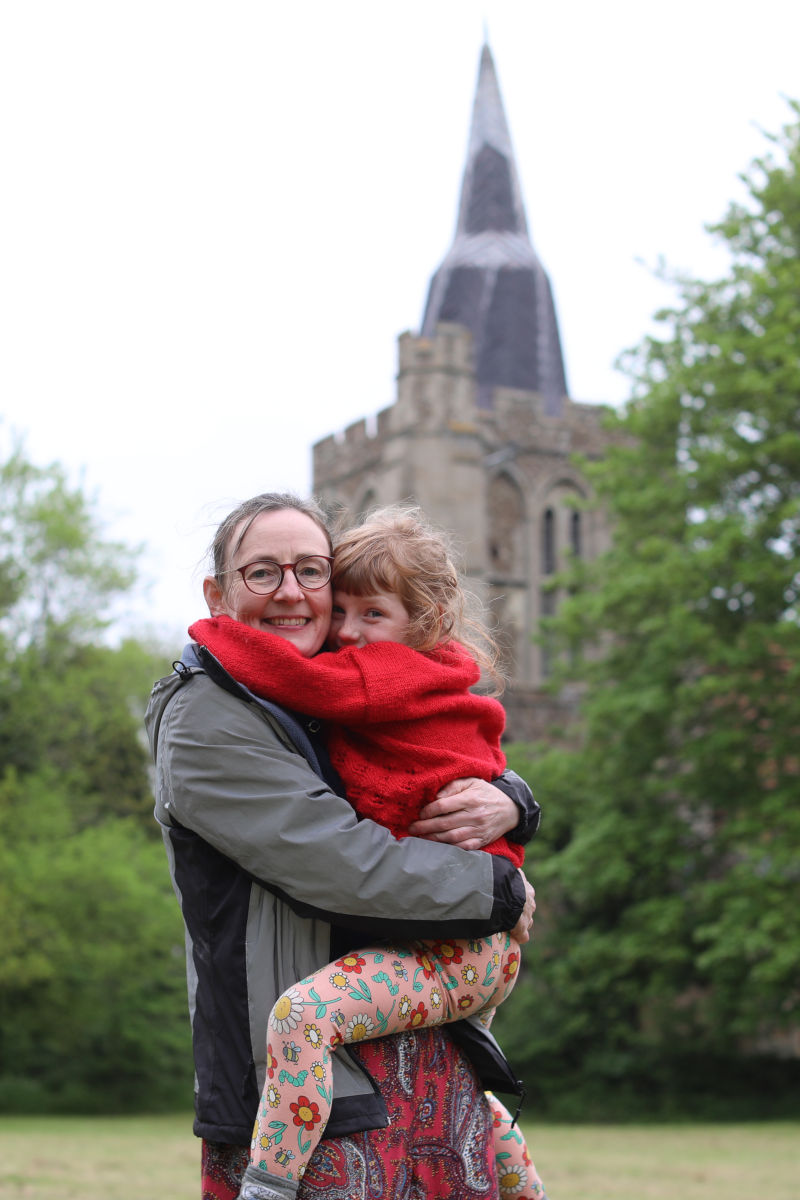 Helen and her daughter in front of St Helena and St Mary church